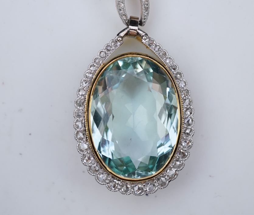 An aquamarine and diamond pendant